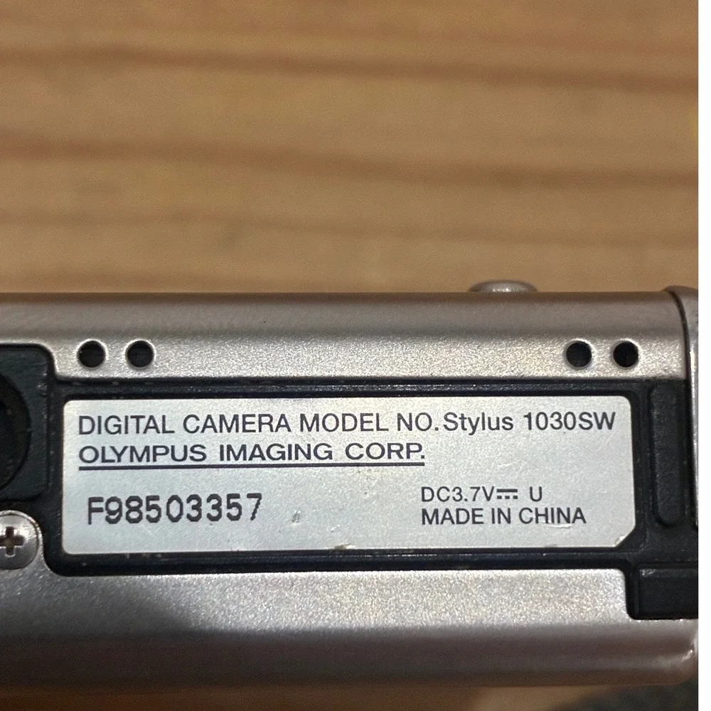 Olympus Stylus 1030 SW 10.1 MP Digital Camera Silver 3.6x Optical Wide Zoom